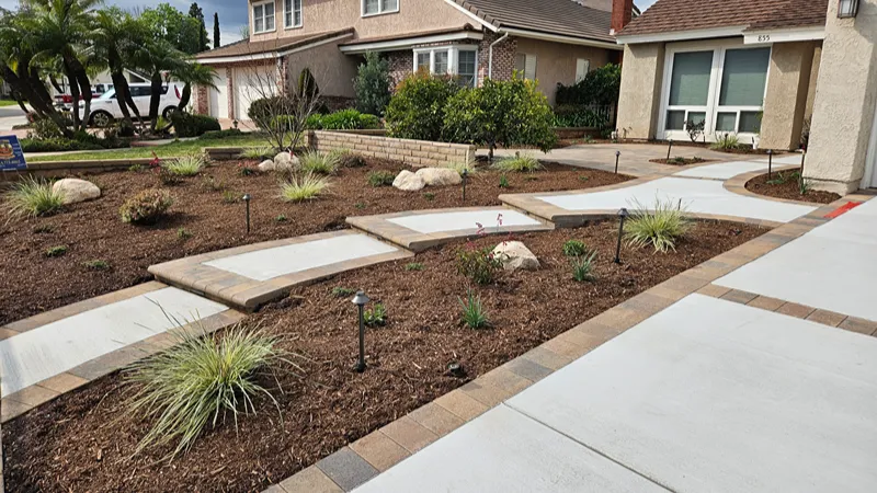 New concrete driveway with Orco paver inlay in Brea