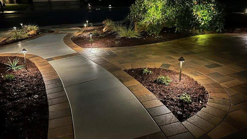 Curved concrete walkway with Orco paver borders and new steps