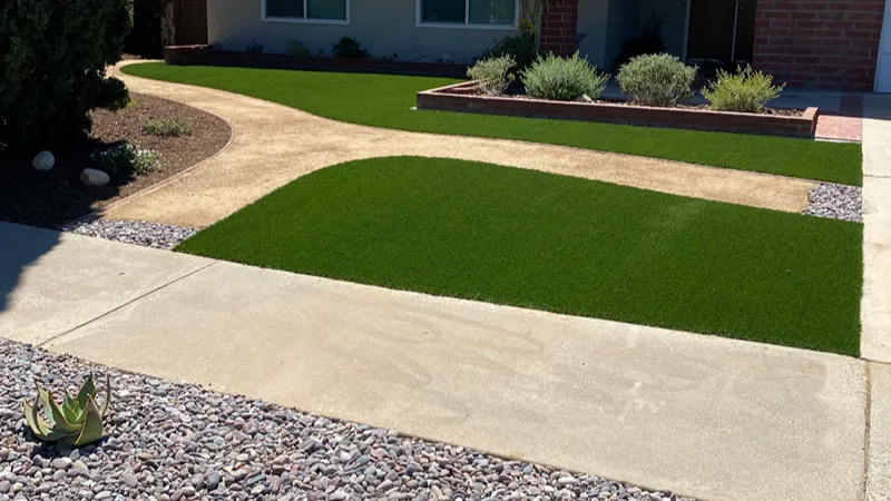 Completed drought-tolerant xeriscape with new plants and ground coverings