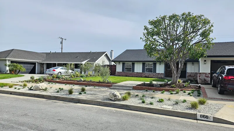 Completed Fullerton front yard with drought-tolerant plants and white river rock
