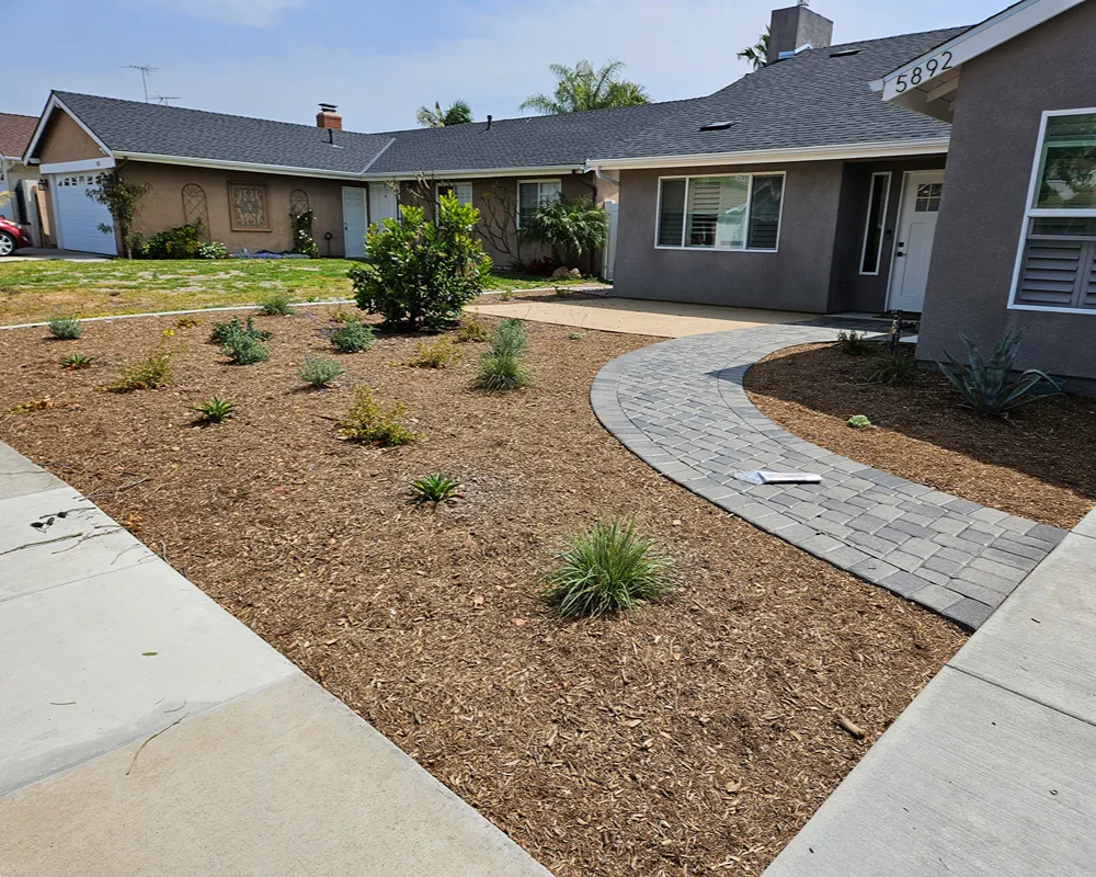 Fresh mulch installed in prepared garden beds in Fullerton