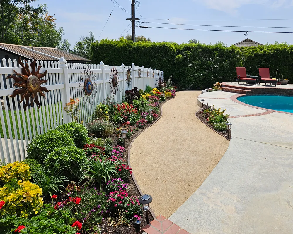 Garden bed installed beside residential hardscaping