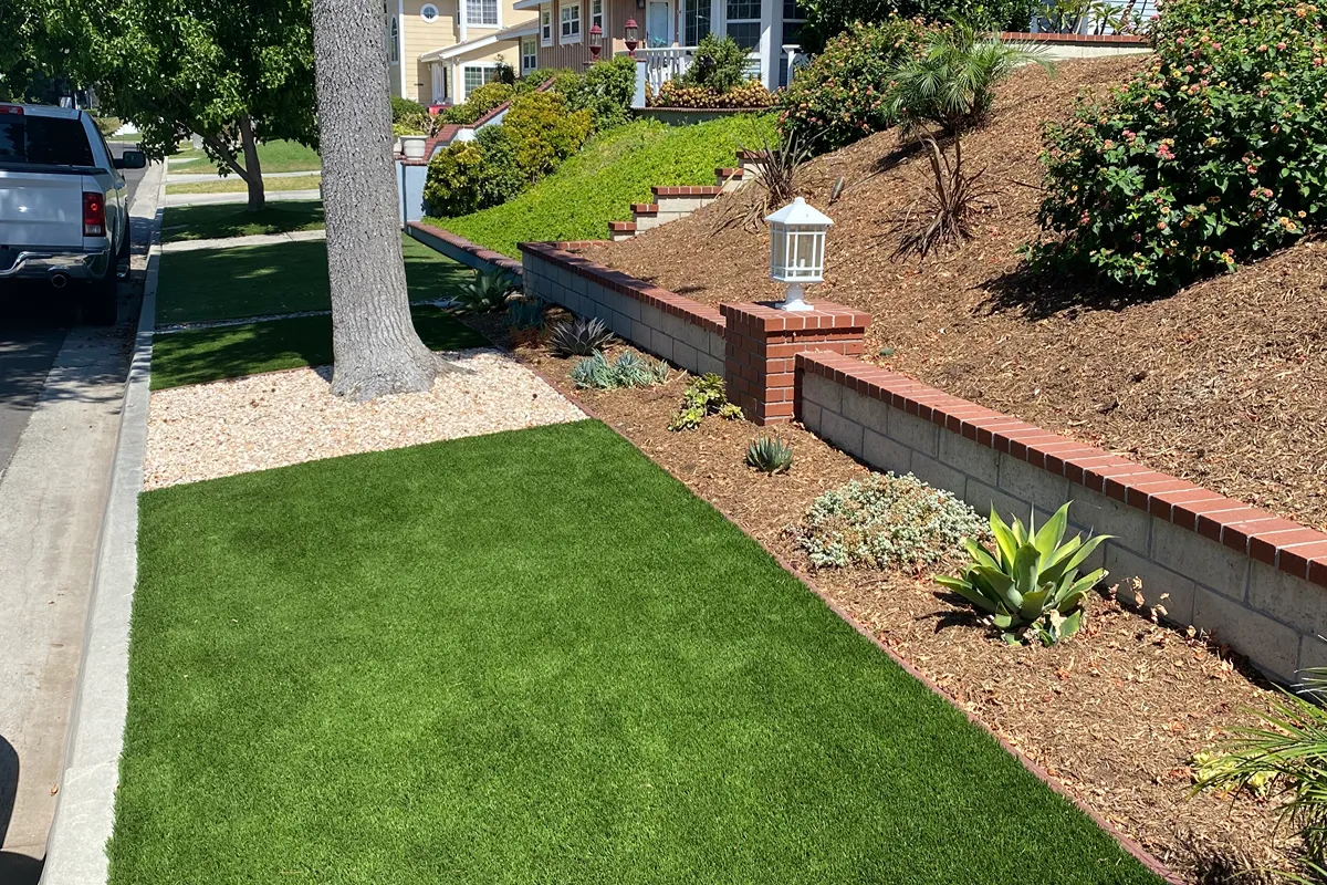 Whittier parkway after artificial turf installation and terraced landscape improvements